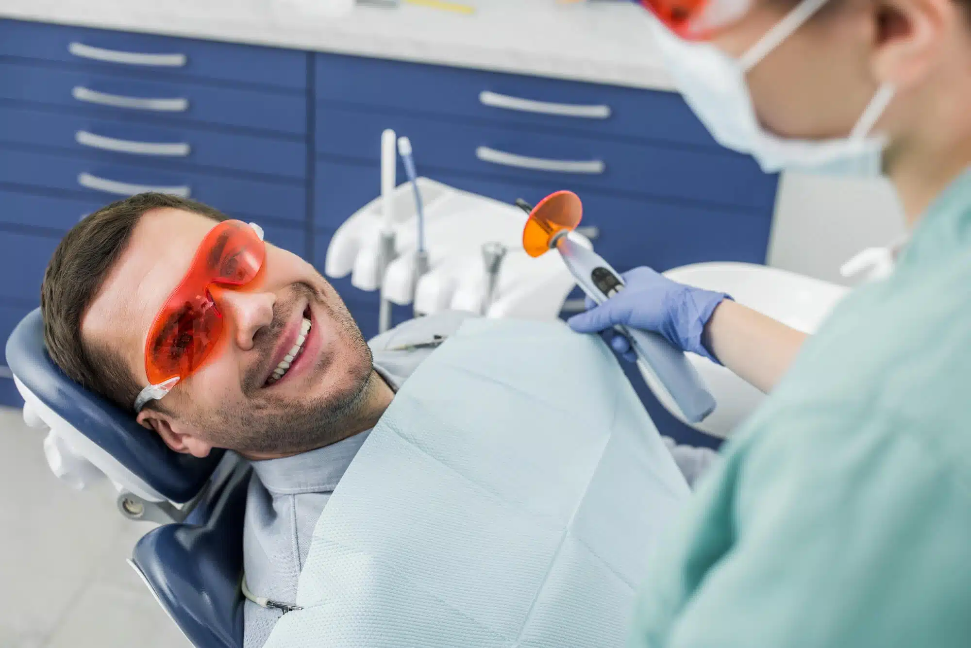 Man smiling after implant supported dentures palm beach gardens