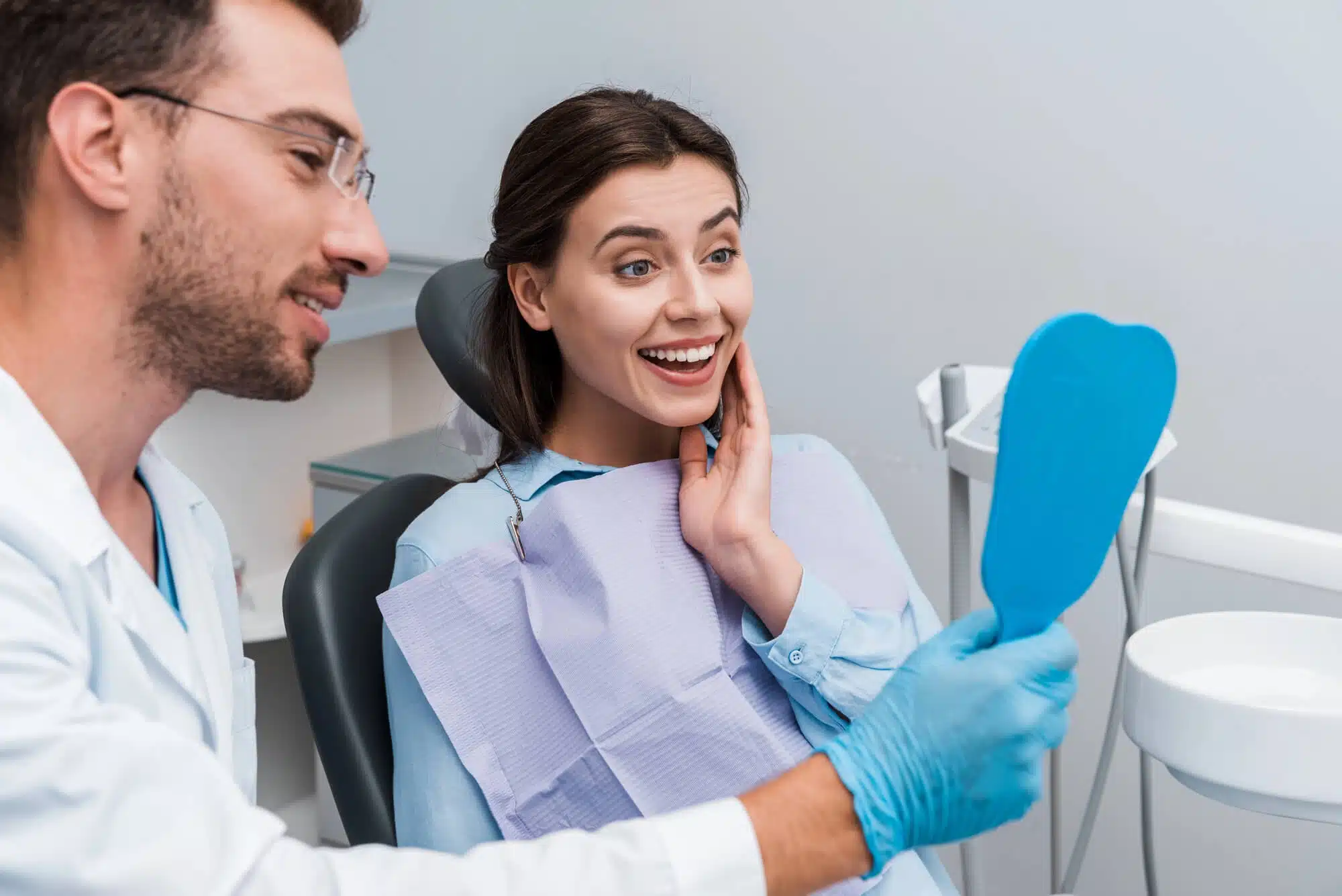 Smiling with periodontist palm beach gardens