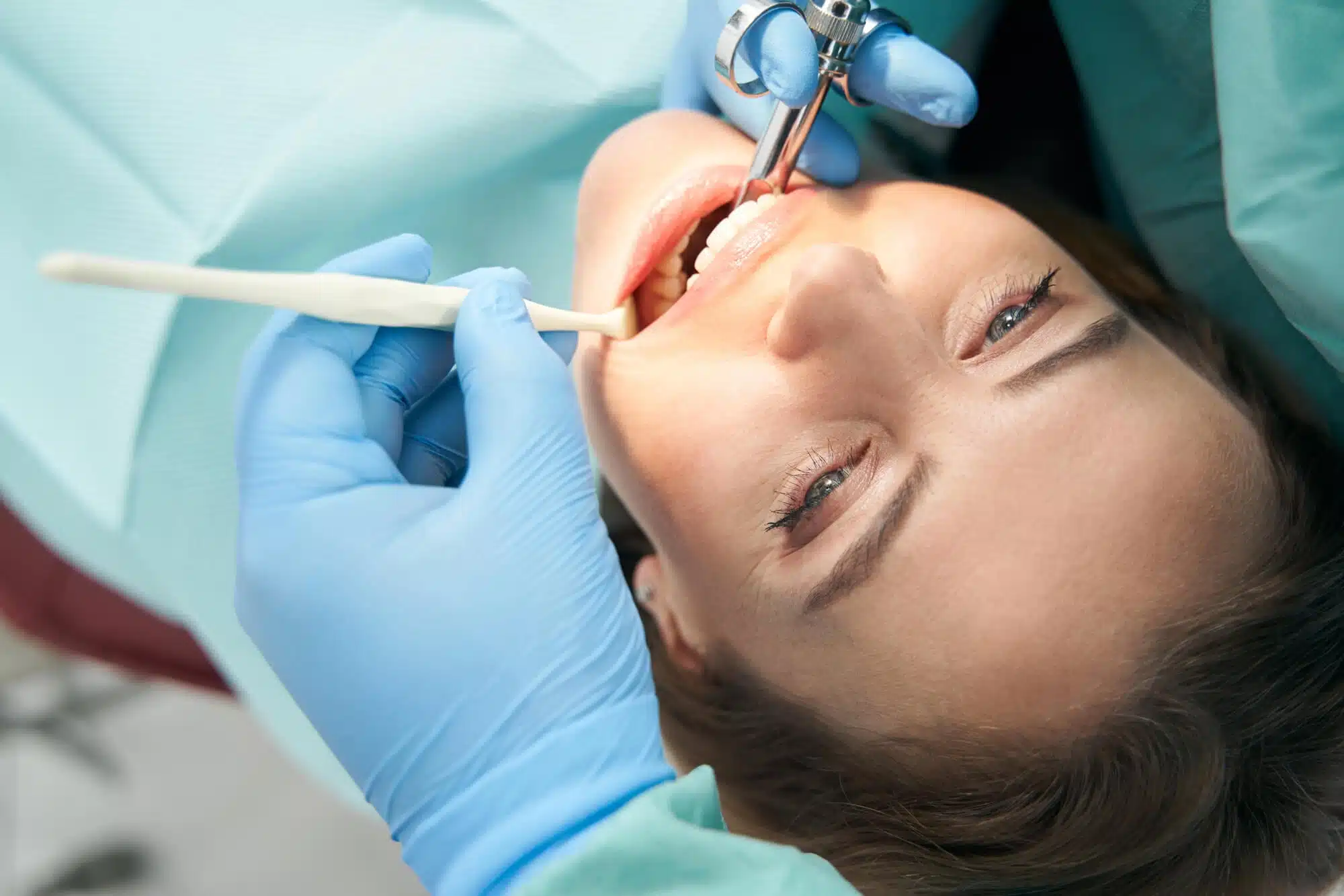 Woman undergoing gum disease treatment palm beach gardens