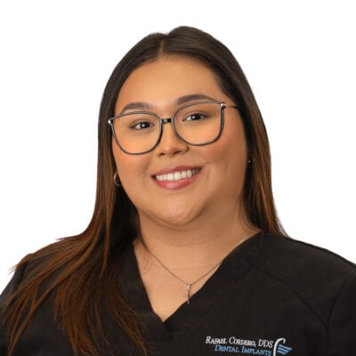 Portrait of Jennifer Sandoval, bilingual dental professional at Rafael E. Cordero DDS PA with experience in clinical and administrative care
